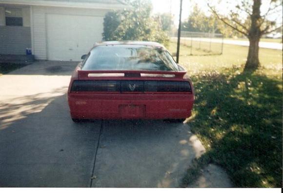 Back of car before paint and 4th gen spoiler