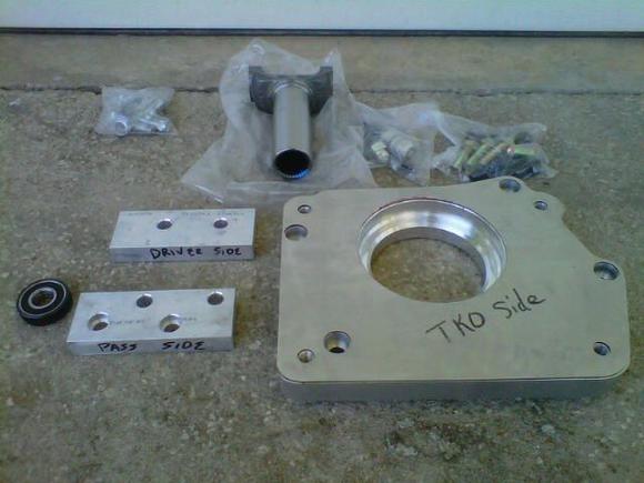Fortes TKO kit2 showing shim plate that will retain the cluster bearing in its proper location on the adaptor