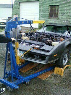 Taking the engine out....in the rain