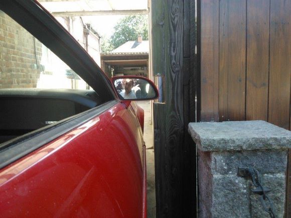 It was a tight squeeze taking her out the garage and through the gates.