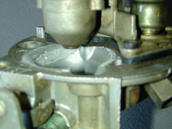 Shaved bore opening and injector pod clearance.