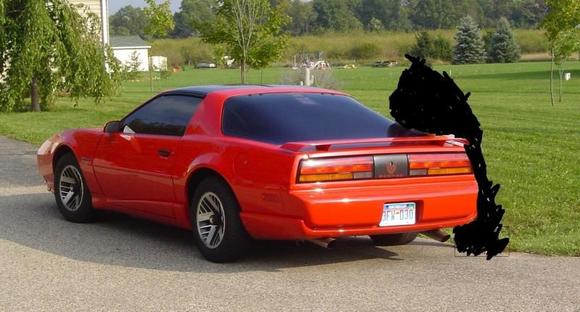 Pic of the car from the craigslist ad, with something odd: is it a hidden person? a mullet for the car? YOU DECIDE!