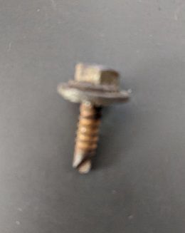 7mm self tapping screw about 5/8" or so long with washer.