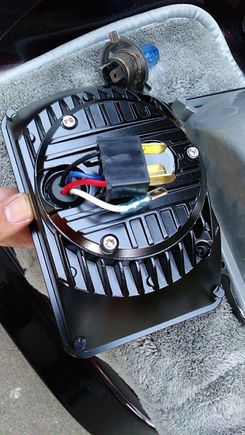 the back side . very plug and play but do have to swap the red and black wires on the headlight harness to match with the LED ones on the VisionX