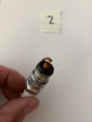 spark plugs not gapped correctly