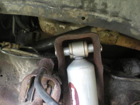 use a breaker bar to break the bolt loose use the proper size socket or youll strip out the head or nuts 
then use the impact to loosen the bolt until the nut comes off 
place nuts and bolts in a place that are out of the way so as to not loose them
