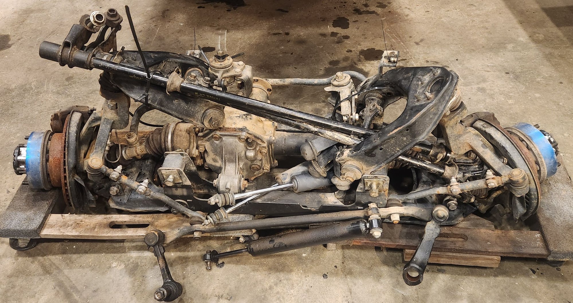 It did put up a bit of a fight getting everything out as one piece. The entire assembly is WAY heavier then i expected. Used chain fall to pick it up to get the dollies under it.