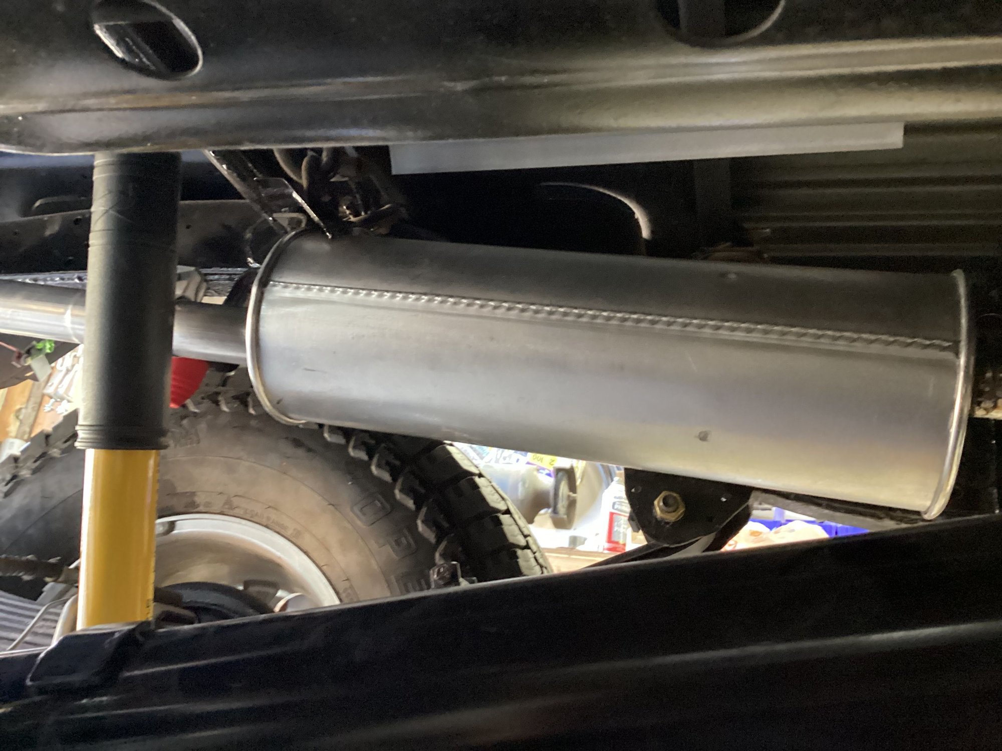 Walkers aftermarket equivalent of the OEM muffler bolted right up to the two bolt hanger.