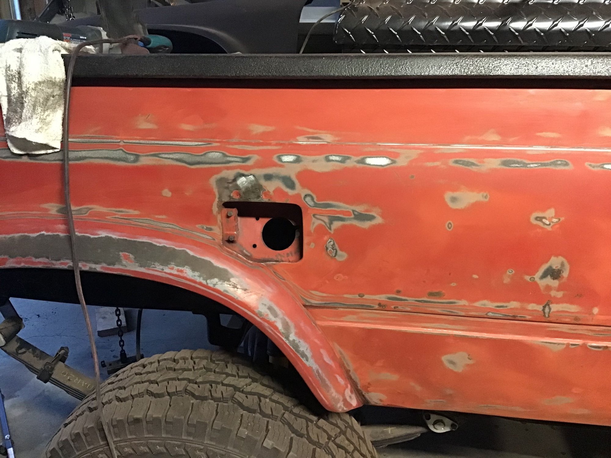 Found a spot of rust just above the fuel filler door so I cut that out and installed a small patch panel. 