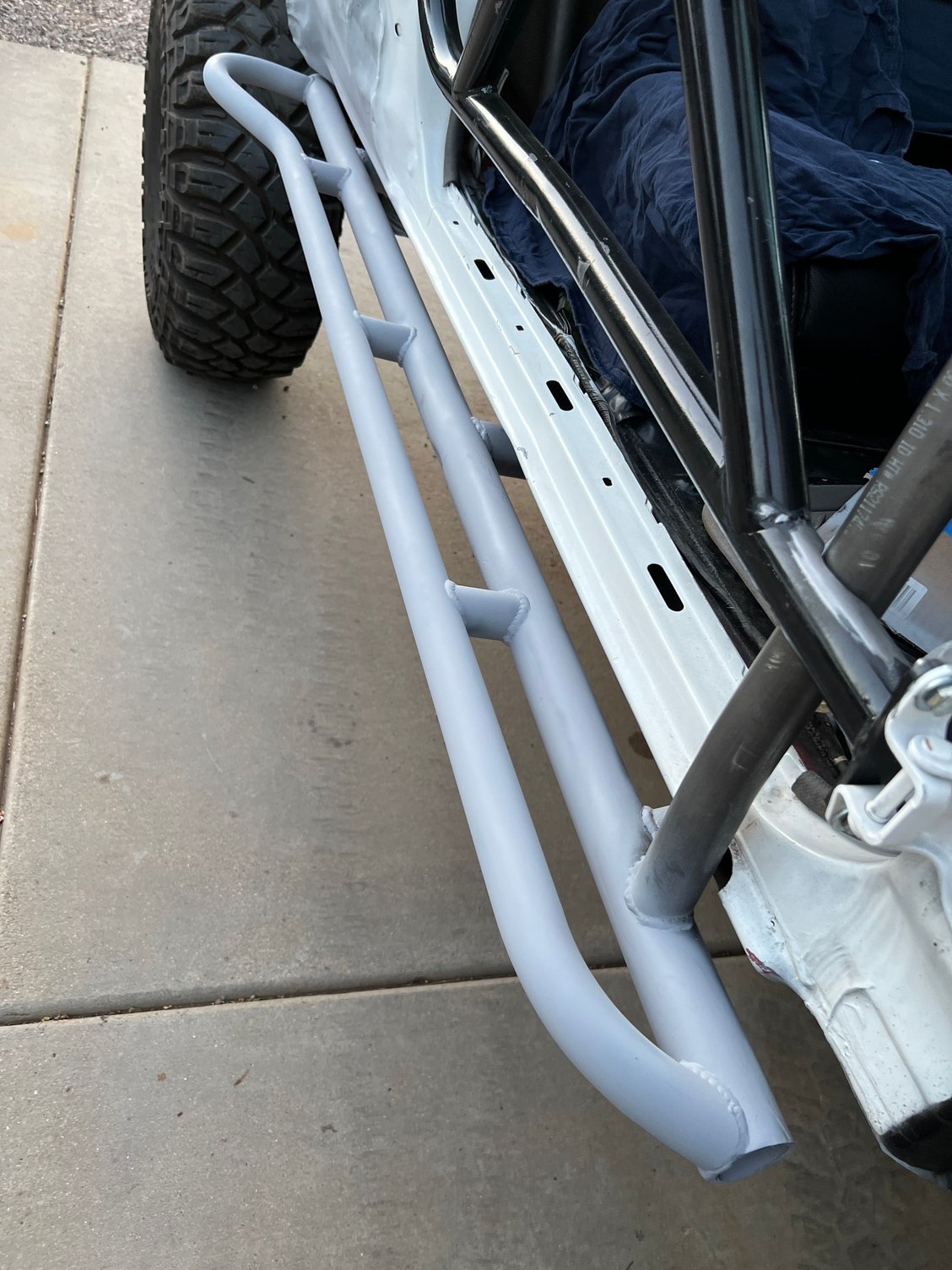 Thre some kick outs on the rock sliders. Brought the A- pillar tube out of the cab for more leg room. 