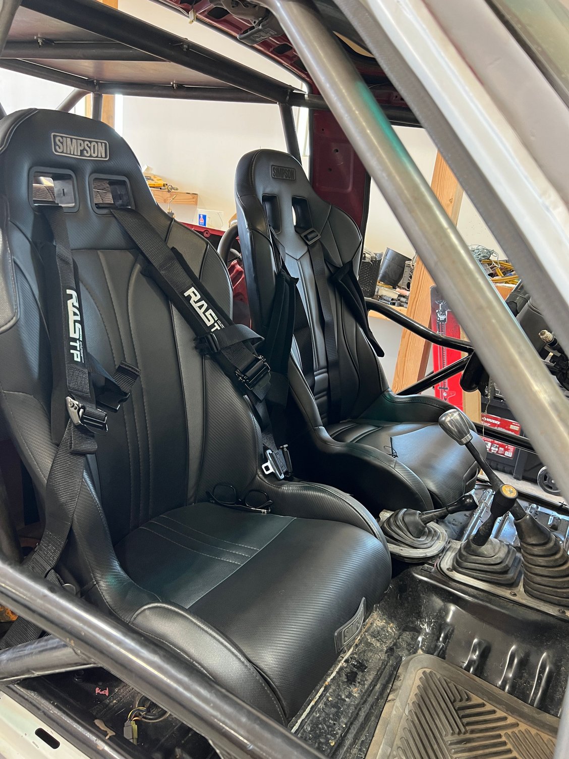 Got the Simpson Seat in And dropped the down a couple more inches. Still working on some fab work to make them adjustable. 