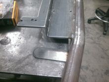 rounded tabs going to the front body mounts (still need to be drilled out in the center, but it's marked.