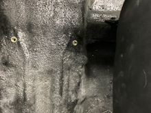 6mm Rivnuts installed in the floor to bolt the console to. 