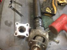 modified t-case flange and new (to me)  hi angle front driveshaft.
