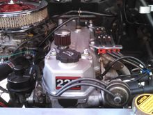 Found a valve cover that had been tanked for a good price along with an new aluminum decal on Ebay. installed new VC gasket, half moons, bolt seals, pcv valve and grommet,