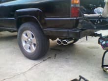 my new dual tip exhaust it looks a little crooked but its not