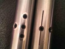 difference in extra oiling holes in the LCE performance Rocker Arm shafts versus the original OEM.