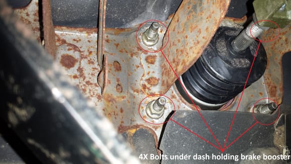 To get it out you need to remove the four bolts in the picture which are underneath the dash
