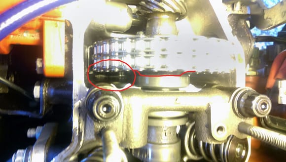 This shows where the timing chain was rubbing due to me being an idiot and putting in the cam sprocket backwards.  Red line shows where the offset SHOULD HAVE been.....no wonder I couldn't find the "dot" that gives you TDC.  No worries....I replaced it with the adjustable cam sprocket and actually installed that one correctly