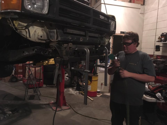 tacking the front spring hanger in place