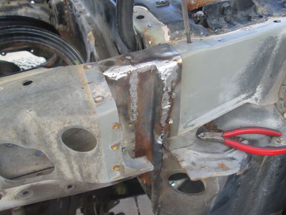 After some heat and hammer forming my excess up flange section sort of fell into place to close and overlap the break.