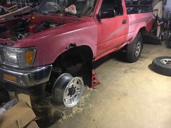 These wheels came off of a Toyota T100 4x4. They seem to fit good and stick out a little farther than the stock steel wheels. My plan is to sand and paint each one with wheel enamel and clearcoat them