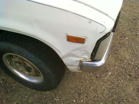 passenger corner old man backed his car into her an just kept shoving even with me honking the horn yelling i pulled most the damage out