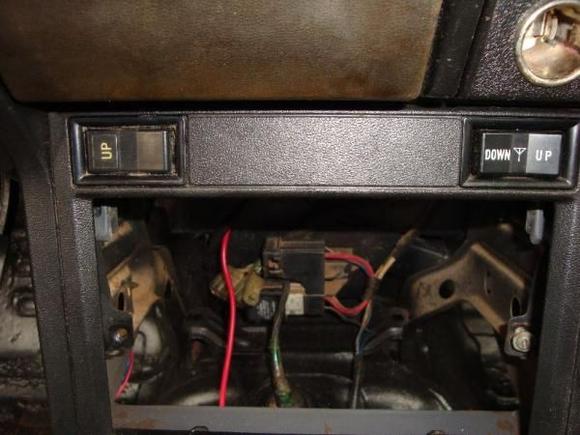 Relocated tailgait glass switch from console to new dash.