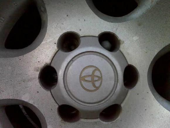 My tire after a LONG drive, with only 1 lug nut holding it on. The rest were completely sheered off.