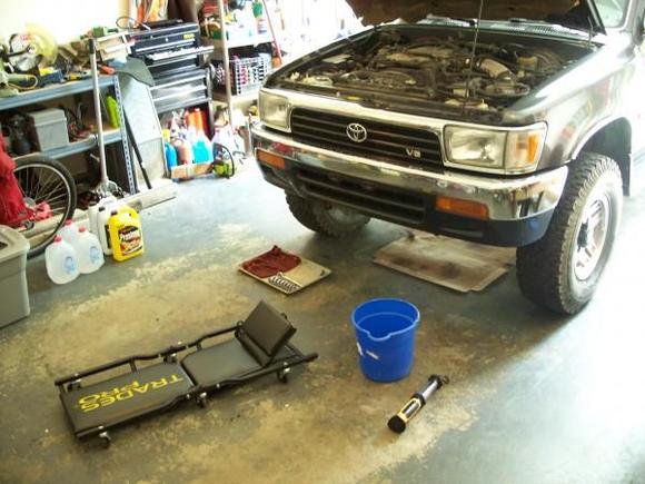 Time for some maintenance.  Coolant rinse and refill and Sea Foam in the brake booster line.