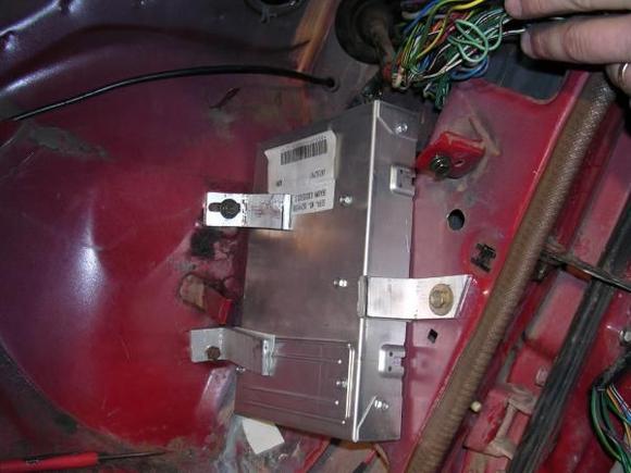 ecm mounted where toyota ecu was mounted. I built some adjustable aluminum brackets and used double sided tape to keep it from moving.