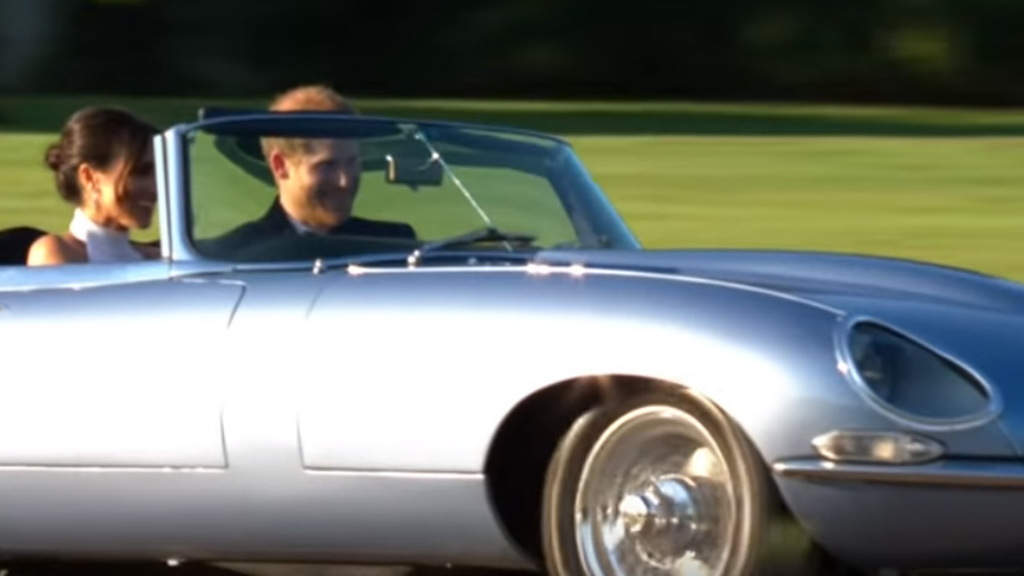 Prince Harry and new wife Meghan Markle in the Jaguar E-Type Zero concept