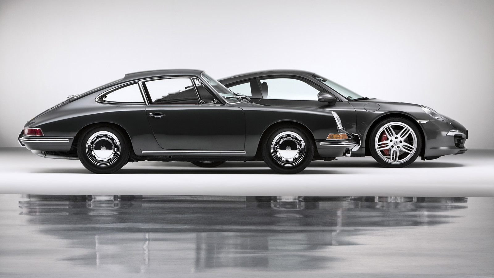 Original 1964 Porsche 911 and the Type-991 2013 Porsche 911 Carrera 4S