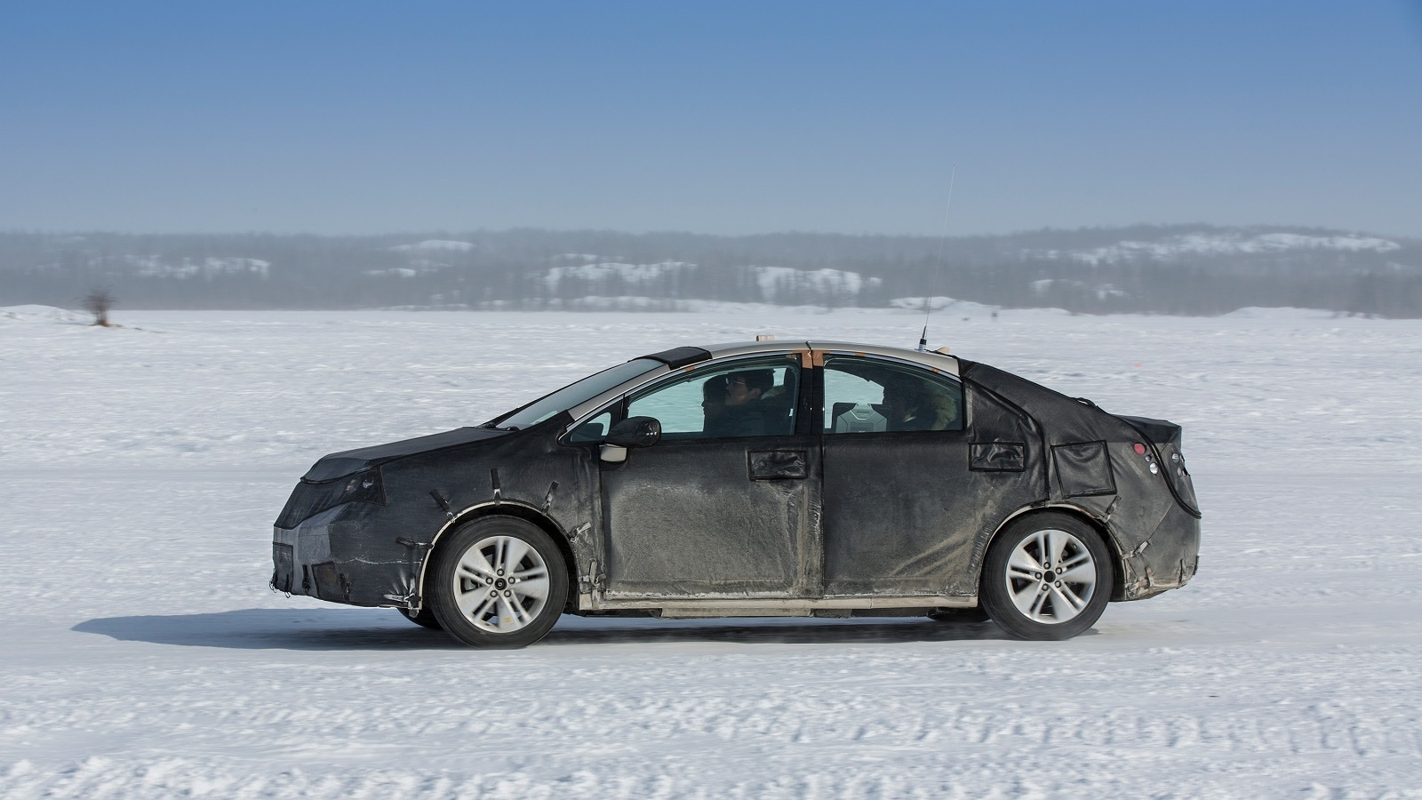 Toyota FCV hydrogen fuel cell vehicle prototype during cold-weather endurance testing in N America