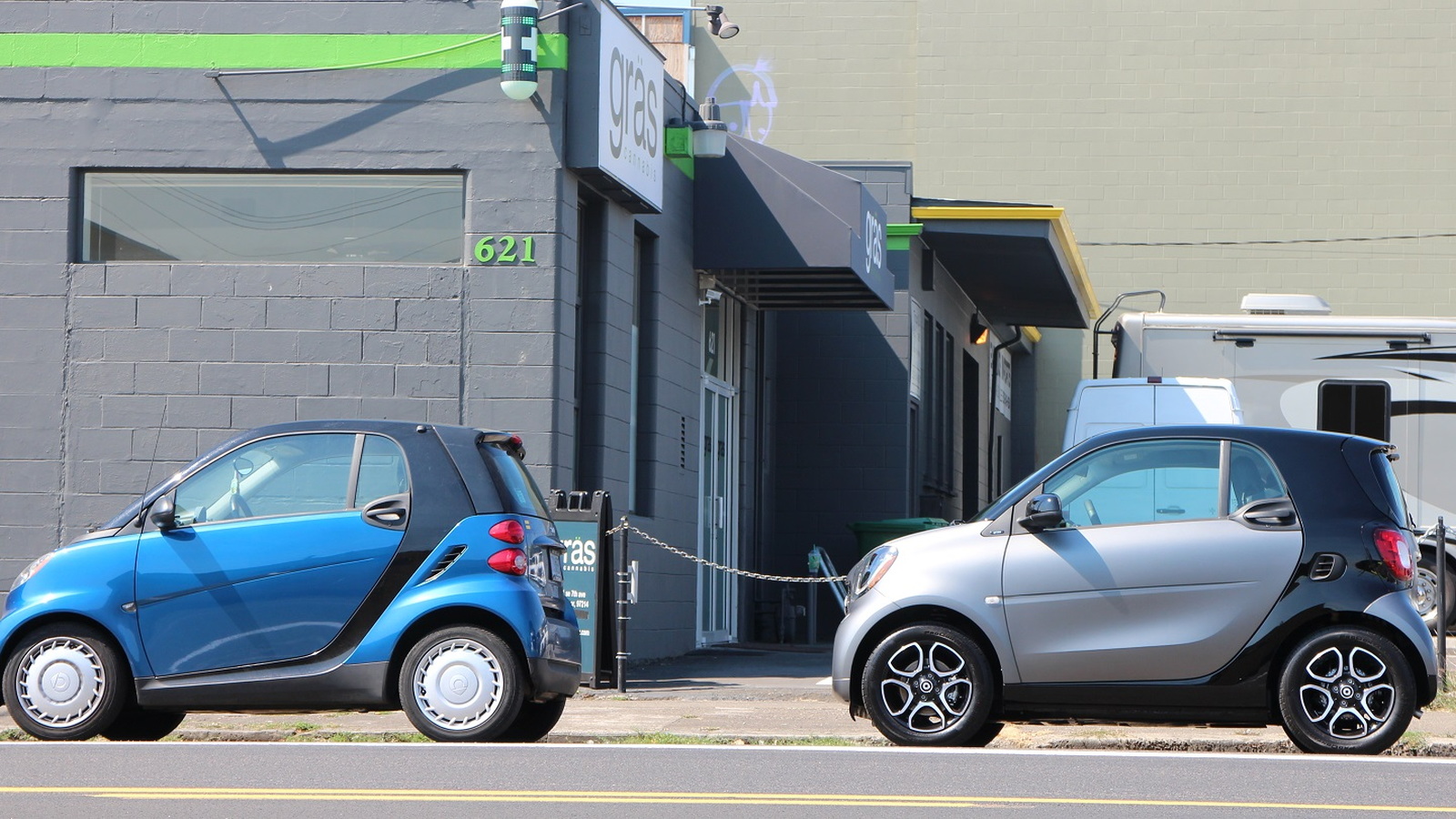 2016 Smart ForTwo minicar, parked behind first-generation model, Portland, Oregon, Aug 2015