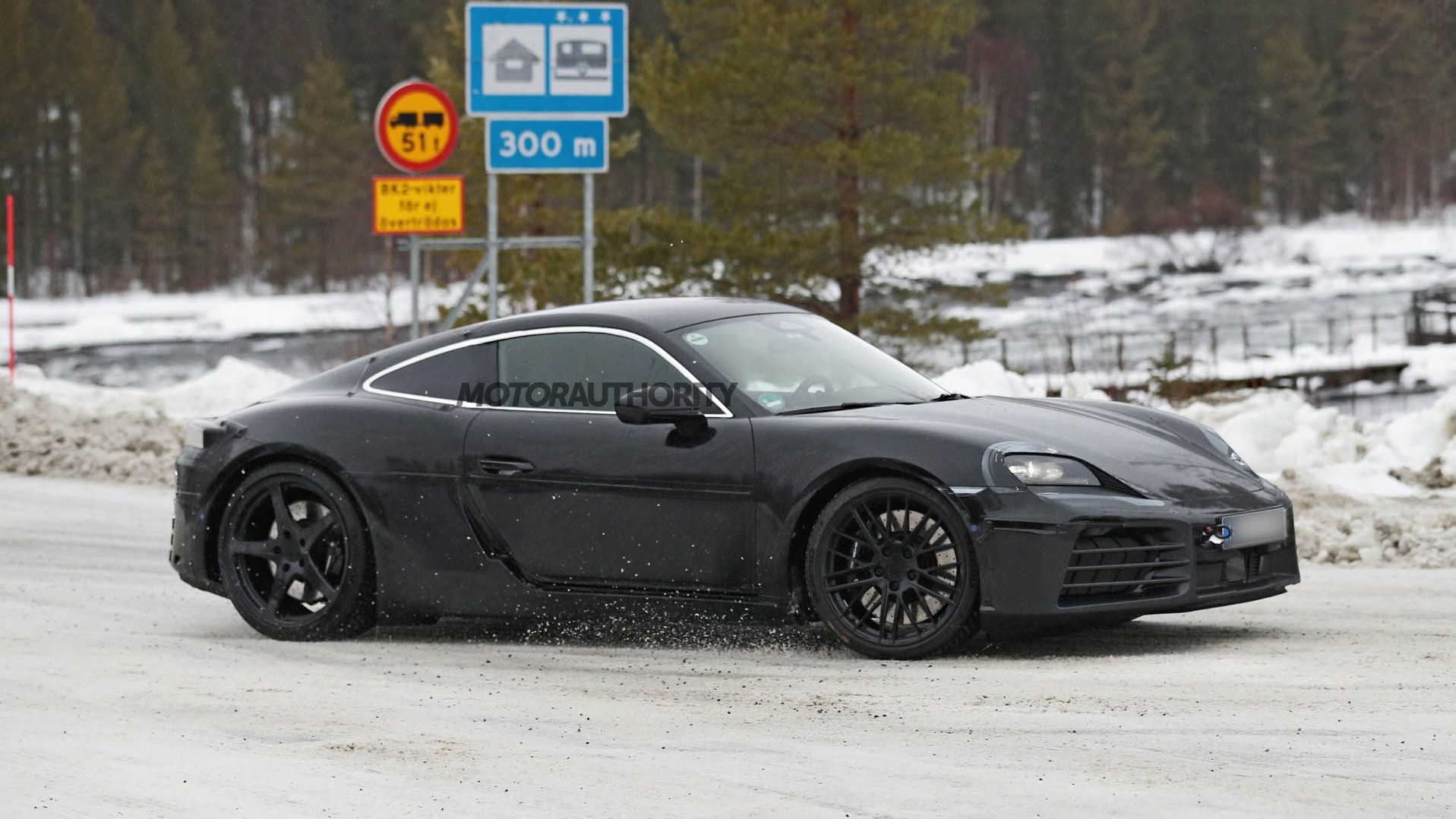 2027 Porsche 718 Cayman EV spy shots - Photo via Baldau