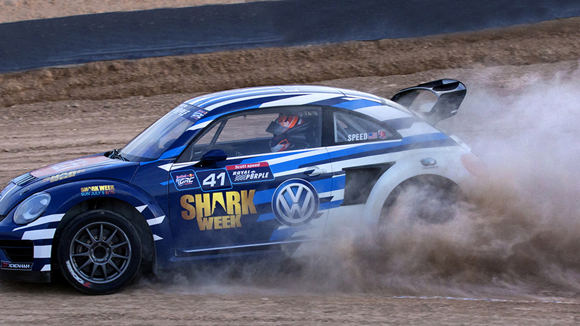 Scott Speed and his Shark Week-themed 2015 Volkswagen Beetle Global Rallycross Championship car