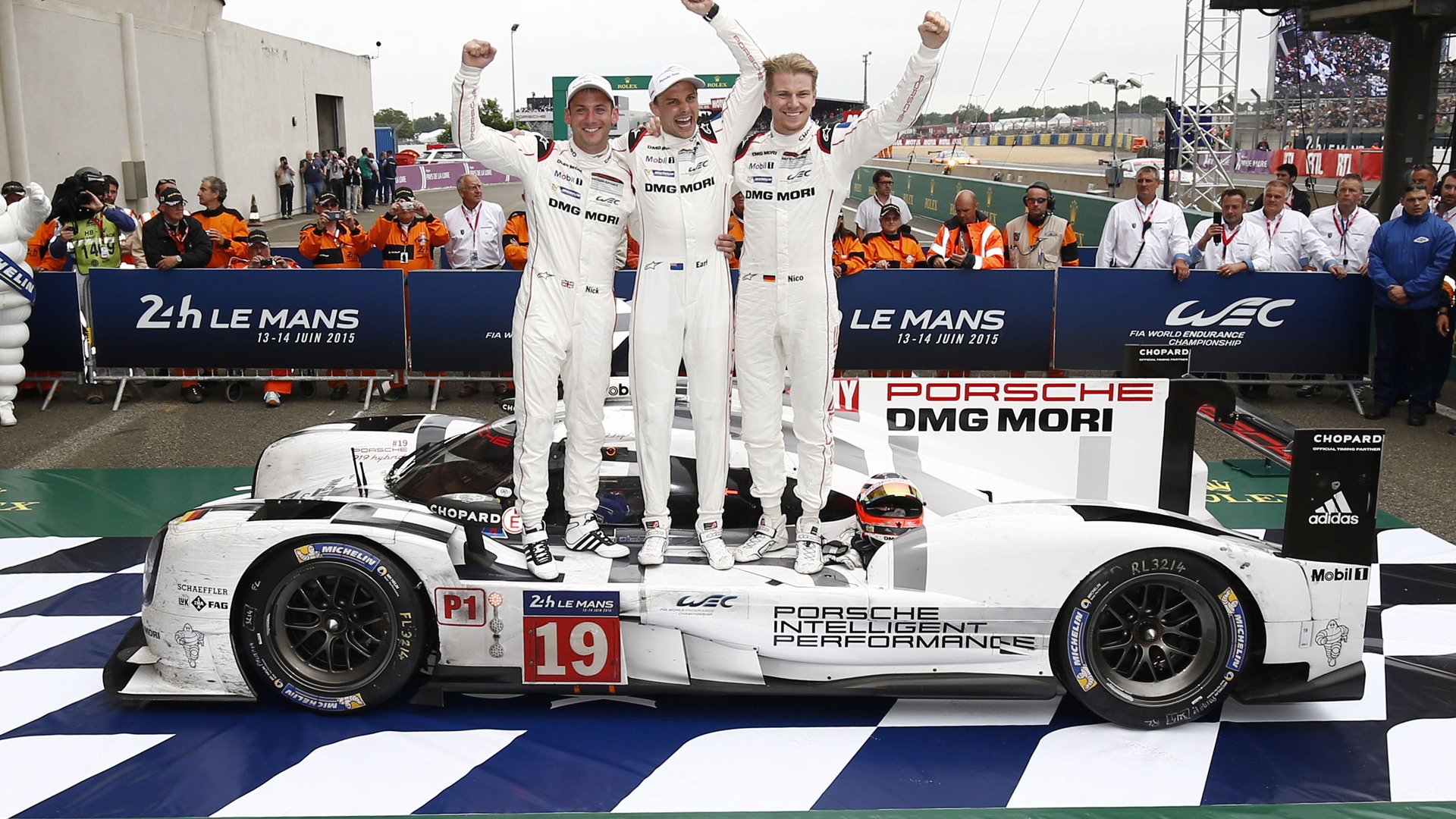 From left to right: Nick Tandy, Earl Bamber & Nico Huelkenberg after 2015 24 Hours of Le Mans win