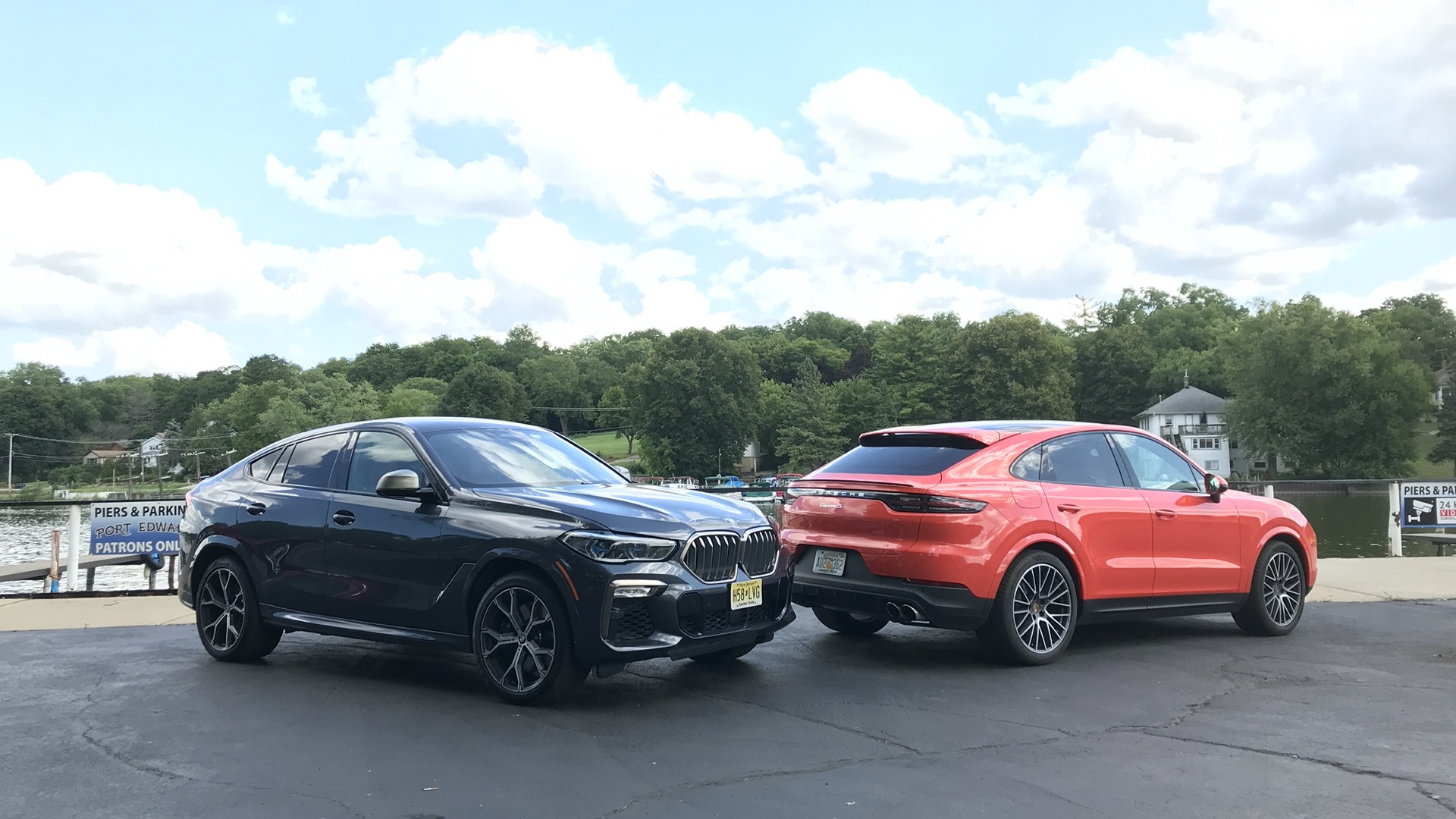 2020 BMW X6 M50i, left, and 2020 Porsche Cayenne Coupe S, right