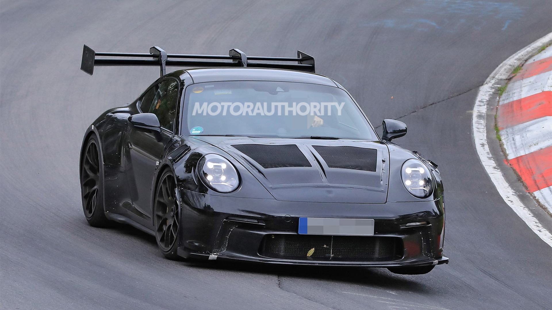 23 Porsche 911 Gt3 Rs Spy Shots New Track Star Takes To The Ring