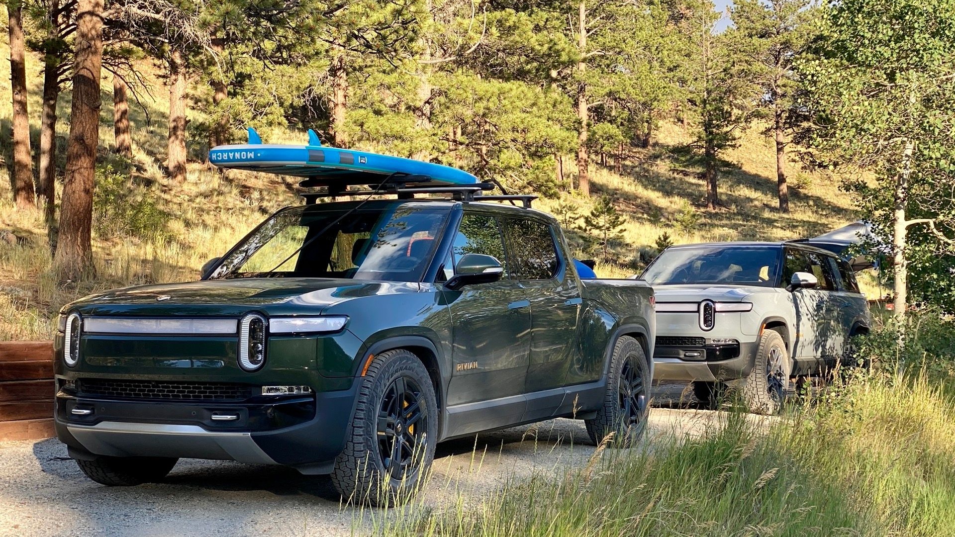 Rivian R1T, green, vs. Rivian R1S, silver