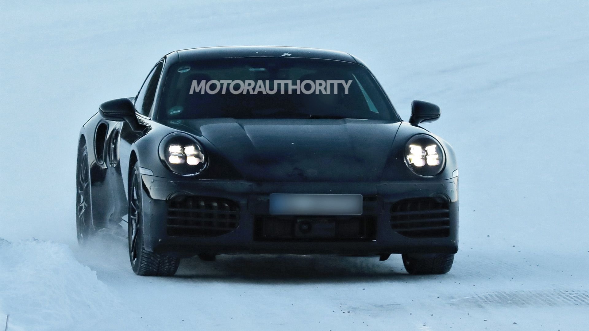 2025 Porsche 911 Turbo facelift spy shots - Photo credit: Baldauf