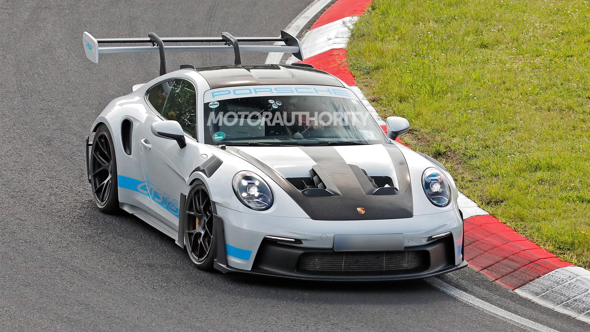 2027 Porsche 911 GT2 RS test mule spy shots - Photo credit: Baldauf