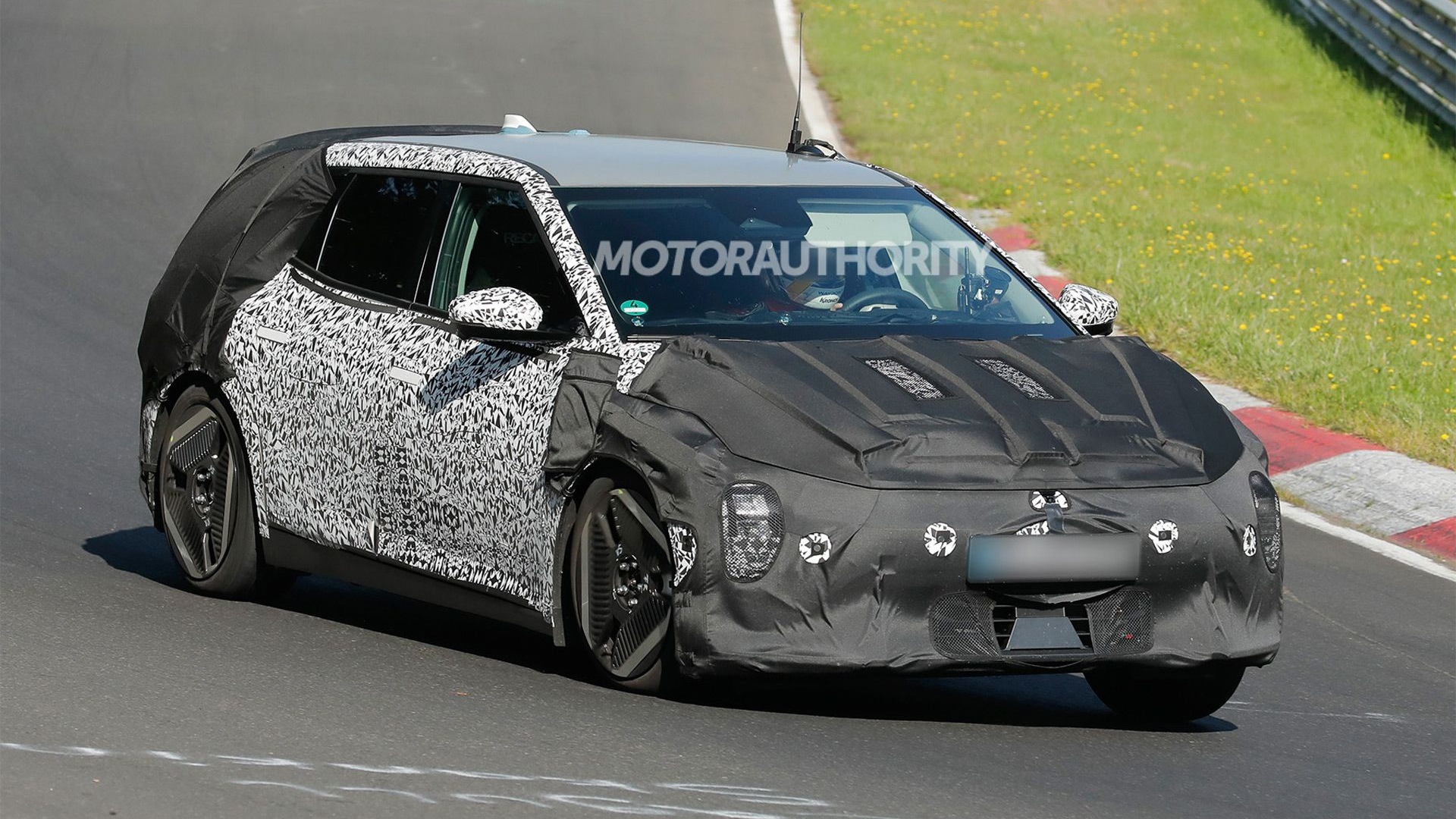 2026 Kia EV4 hatchback spy shots - Photo via Baldauf