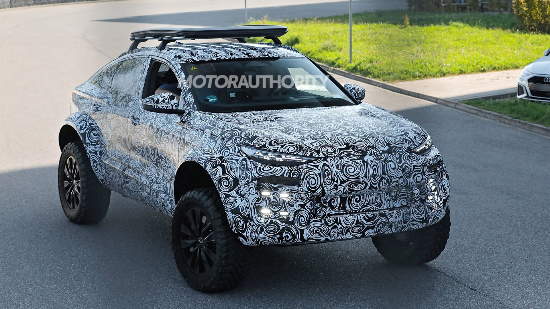 Audi Q6 Sportback E-Tron off-roader spy shots - Photo via Baldauf