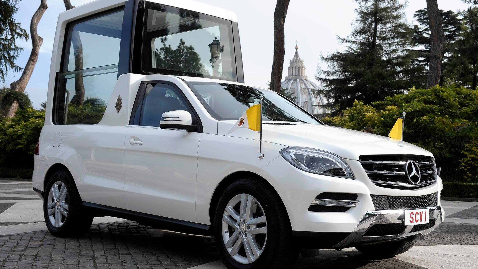 Pope Benedict XVI takes delivery of his new M Class Popemobile at the Vatican, December 2012
