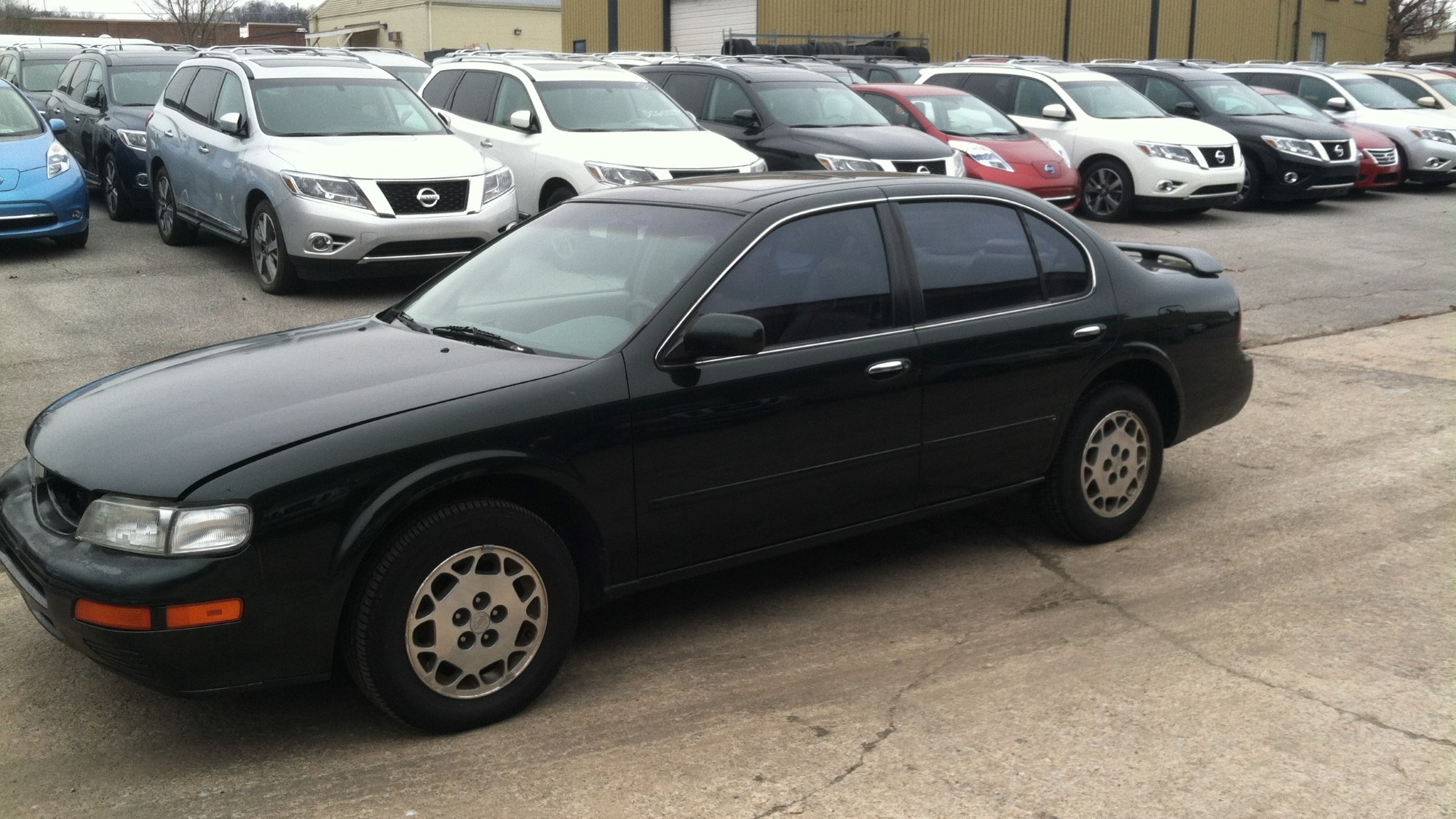 1996 Nissan Maxima from Craigslist ad at its new home in Nissan's U.S. headquarters