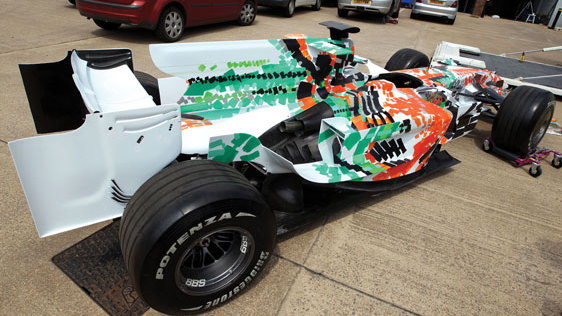 The former Force India F1 car, repainted by Dexter Brown. Image: RM Auctions