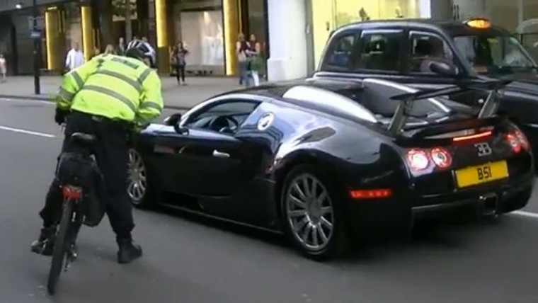 Bugatti Veyron driver pulled over by bicycle cop.
