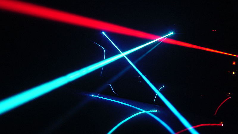 Laser beams on a car windshield, photo courtesy of Wikimedia Commons